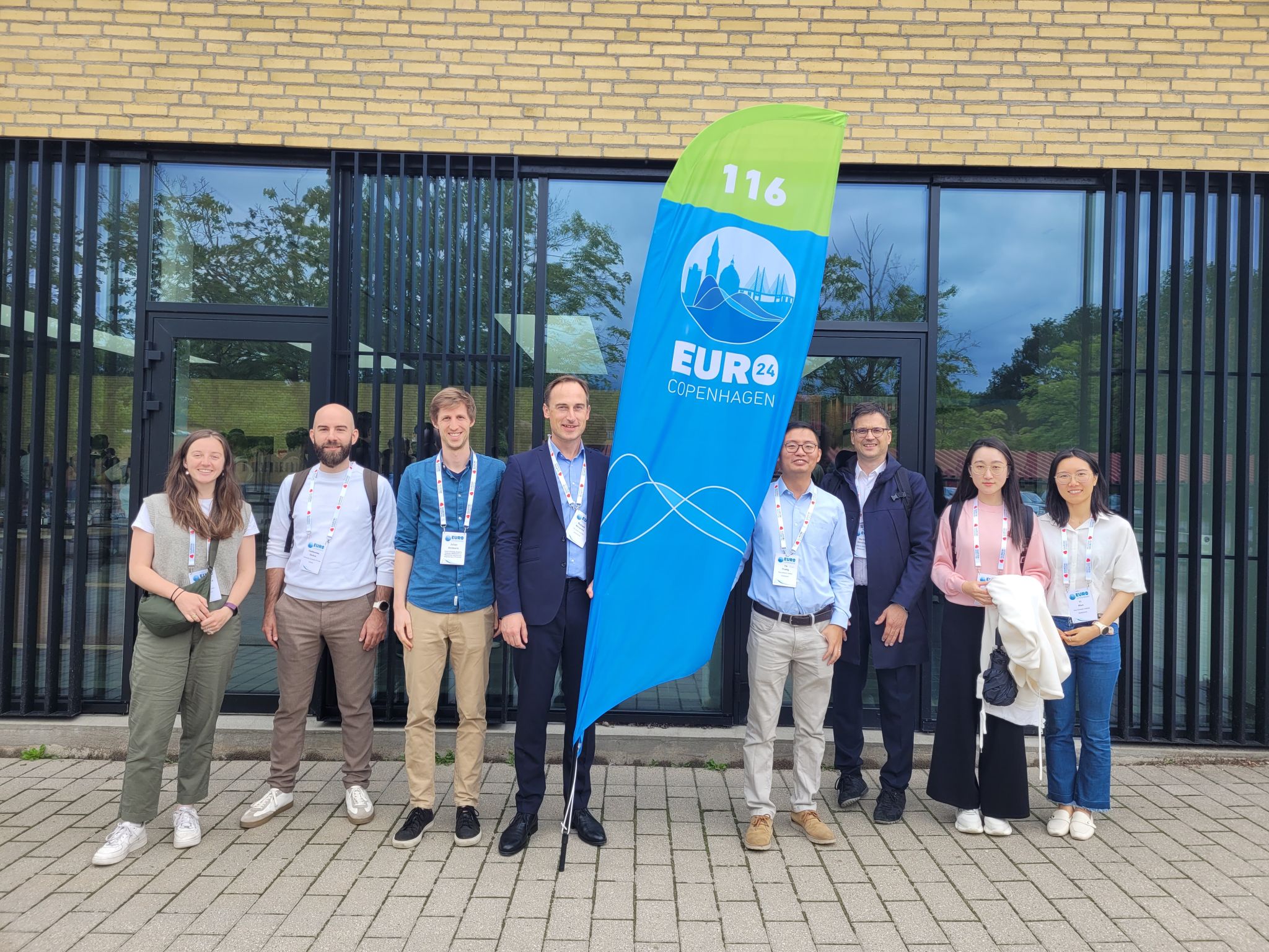 Researchers from the Chair of Energy Systems Analysis standing together at the EURO24 conference